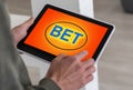 man placing bet with tablet computer, closeup Royalty Free Stock Photo