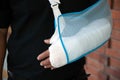 Man with a plaster because broken arm. Royalty Free Stock Photo