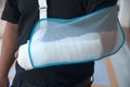 Man with a plaster because broken arm. Royalty Free Stock Photo