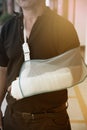 Man with a plaster because broken arm. Royalty Free Stock Photo
