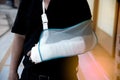 Man with a plaster because broken arm. Royalty Free Stock Photo