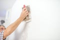 Man plastering a white wall Royalty Free Stock Photo