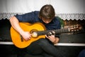 Man playing acoustic guitar Royalty Free Stock Photo
