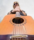 Man playing acoutic guitar Royalty Free Stock Photo