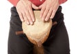 Man playing African drum on his lap Royalty Free Stock Photo