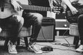 Man Playing Amplified Acoustic Guitar