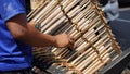 A man is playing angklung.