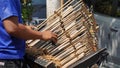 A man is playing angklung.