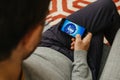 Man playing arcade game on the new iPhone x by Apple Computers