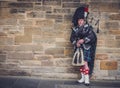 Man playing bagpipes in Edinburgh