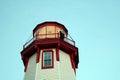 Bagpiper on Top of Illumined Lighthouse Royalty Free Stock Photo