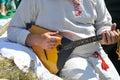 Man playing the balalaika