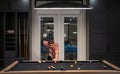 Man Playing the billiards. Man play american billiard in Billiard room. Snooker Player. Young professional man playing
