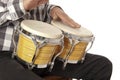 Man playing bongo on his lap Royalty Free Stock Photo