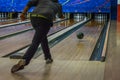 Man playing bowling seen from the back Royalty Free Stock Photo