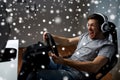 Man playing car racing video game at home Royalty Free Stock Photo