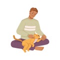 Man playing with cat, teenage boy with kitten