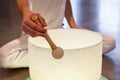 Man playing crystal bowl healing music