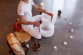 Man playing crystal bowl healing music