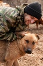 A man playing with a dog Royalty Free Stock Photo