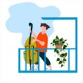 Man playing double bass on the balcony. Neighbourhood concert. Creative activitiy. Social distancing during COVID-19 Royalty Free Stock Photo