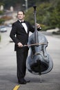 Man playing the double bass in the street Royalty Free Stock Photo