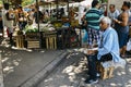 Man playing drums at street market in Rio Royalty Free Stock Photo