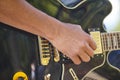 Man playing electric guitar detail. Musician. Musical instrument