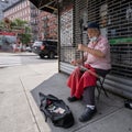 A Man Playing Erhu in Chinatown, New York