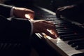 Man playing grand piano, closeup. Talented musician Royalty Free Stock Photo