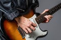 Man playing guitar. Close up hand playing guitar. Musician playing guitar, live music. Electric guitar. Repetition of