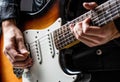 Man playing guitar. Close up hand playing guitar. Musician playing guitar, live music. Musical instrument. Electric