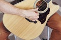 Man playing the guitar, musical instruments, music, musician, close-up, hands Royalty Free Stock Photo