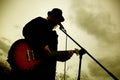 Man playing guitar outdoors Royalty Free Stock Photo