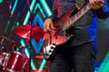 Man playing guitar on a stage musical concert. Royalty Free Stock Photo