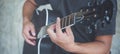 Man playing guitar in vintage tone style,music studio Royalty Free Stock Photo