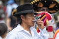 Man playing harmonica in the street