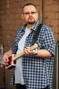 Man playing his cigar box guitar Royalty Free Stock Photo