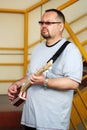 Man playing his cigar box guitar Royalty Free Stock Photo