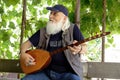 Man playing his handmade Baglama