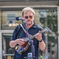 Man Playing the Mandolin Instrument