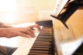 Man playing piano indoors. Music lesson Royalty Free Stock Photo