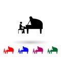 Man playing piano multi color icon. Simple glyph, flat vector of music icons for ui and ux, website or mobile application