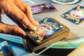 A man playing Pokemon Trading Card game