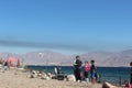 A man playing with a quadrocopter on the beach in Eilat, people, israel