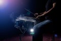 The man is playing snare drum in low light background. Royalty Free Stock Photo