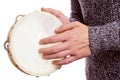 Man playing a tambourine