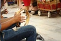 A man is playing tambourine at the park Royalty Free Stock Photo