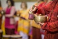 Man playing on a tibetian singing bowl Royalty Free Stock Photo