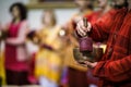 Man playing on a tibetian singing bowl Royalty Free Stock Photo